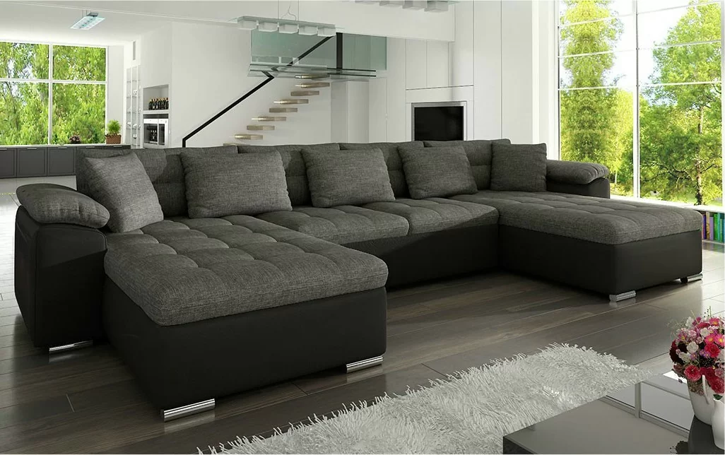 Manaya Gigant-U sofa i sort med grå meleret hynder